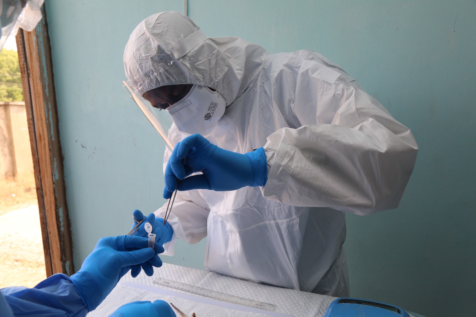 Scientist picking a research sample